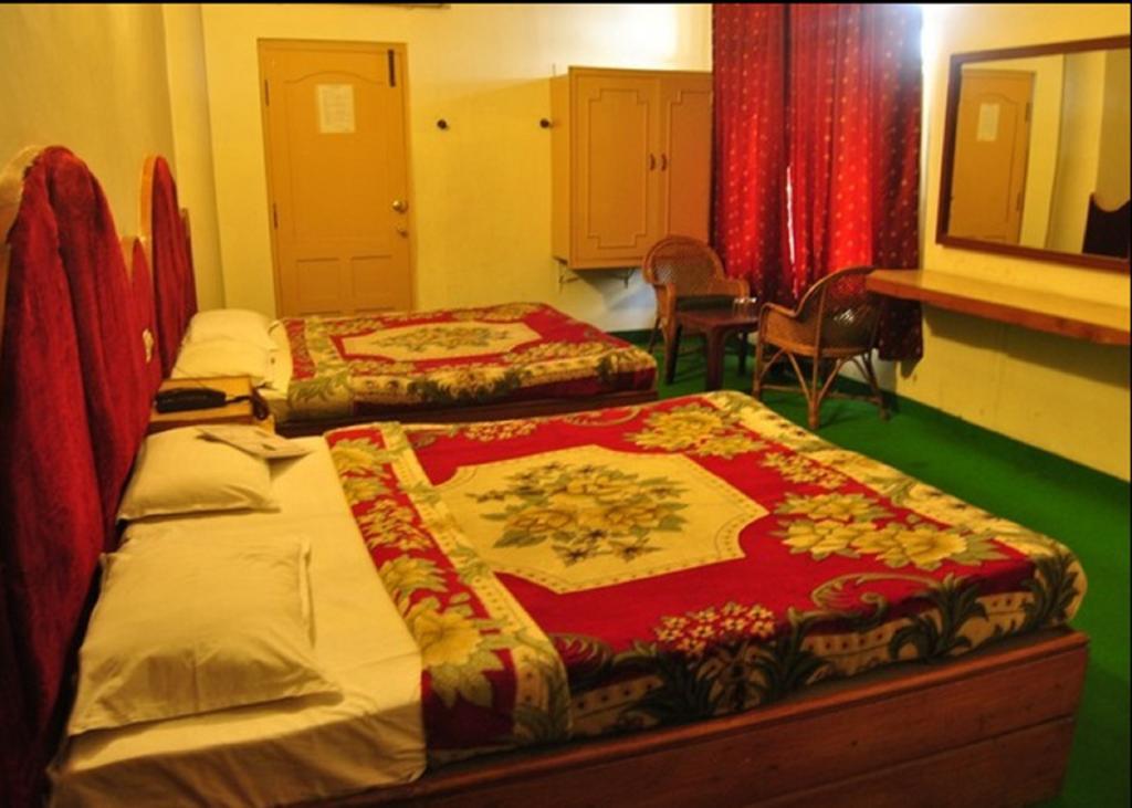 Hotel Ruby International Kodaikanal Quarto foto
